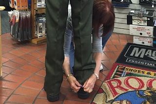 High Quality Accessories — Women Measuring The Correct Length of the Police Pants in Fresno, CA
