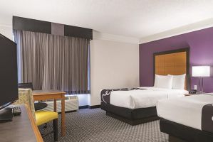 Guest room at the La Quinta Inn & Suites by Wyndham Ontario Airport in Ontario, California