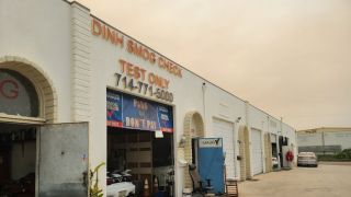 car inspection station orange Dinh's Smog Check Station