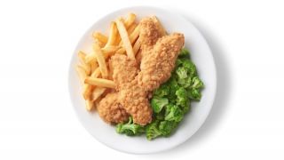 Chicken tenders served with broccoli and fries