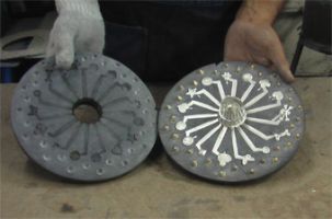Black vulcanized rubber molds with molten metal