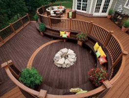 Image of Trex decking in a circular pattern with outdoor fireplace.
