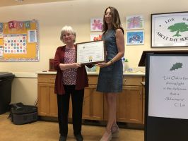 Santa Clara County Supervisor Susan Ellenberg presents a County Commendation for Live Oak's 40 years of service in the Santa Clara County.