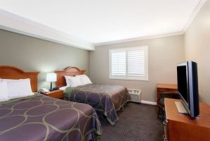 Guest room at the Super 8 by Wyndham Torrance LAX Airport Area in Torrance, California