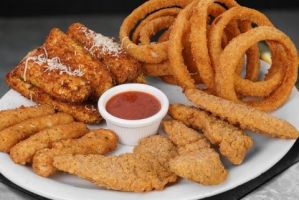 Decorative image of onion rings, fried chicken fingers and fried mozzarella sticks