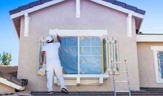 Man painting house - MG Painting Co in the High Desert, CA